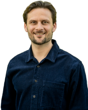 Portrait of Billy Nightingale looking at web design on laptop